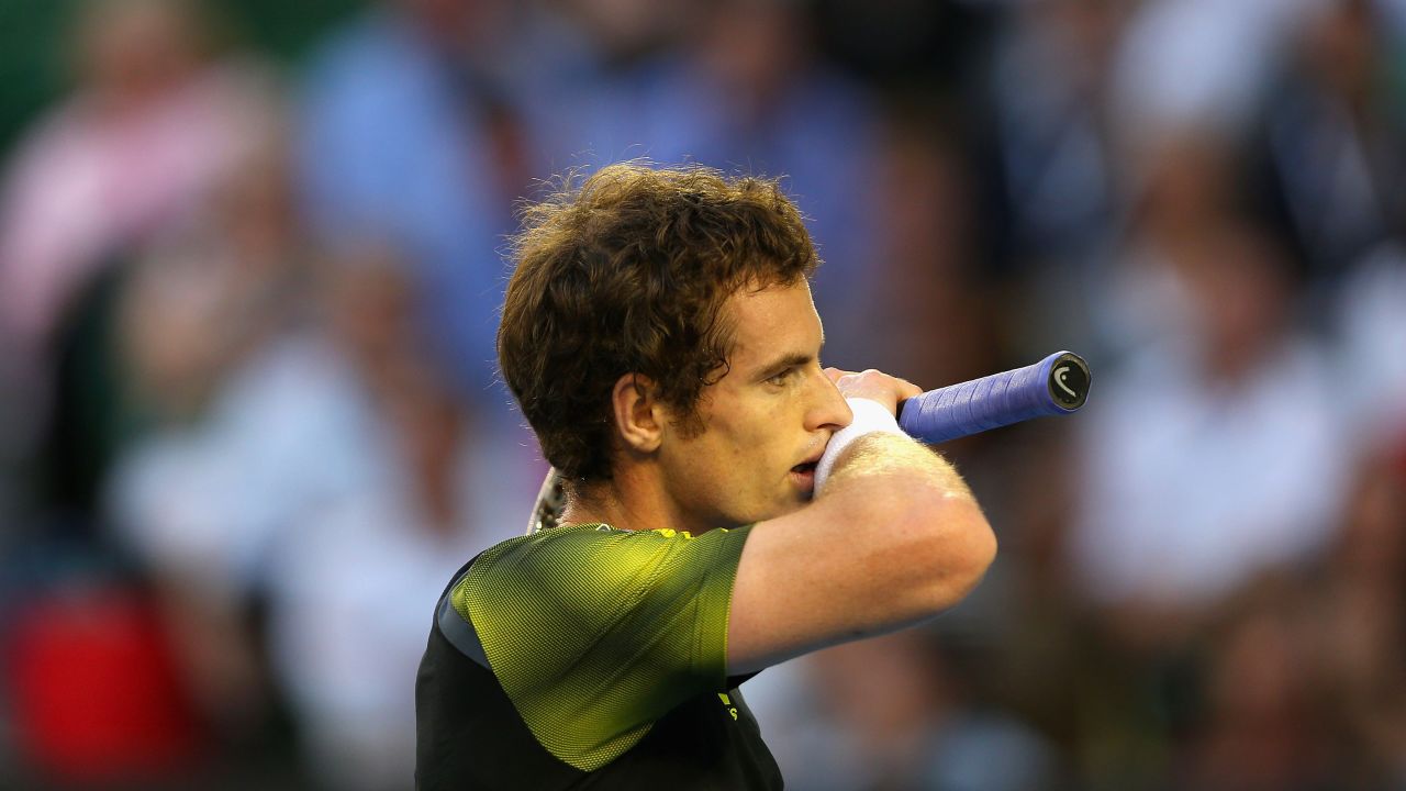 Andy Murray of Great Britain takes a breather in his semifinal match against Roger Federer of Switzerland on January 25.