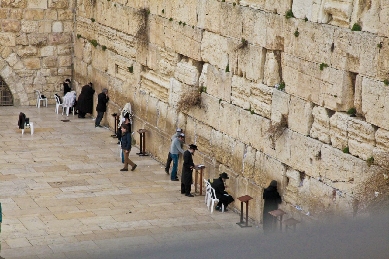 Men pray at the Wailing Wall, the only remnant of the ancient Jewish Temple in Jerusalem.