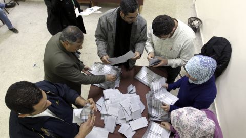 Jordanian election officials start counting votes in Amman on Wednesday.