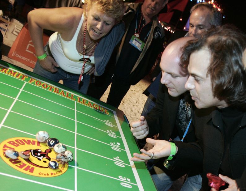 Regionally unique games, like this hermit crab race during Super Bowl XLI at Miami's Dolphins Stadium, add local flair to the party.