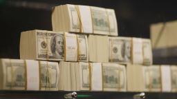 Stacks of money are seen in what is being called a first-of-its-kind exhibit of five million dollars in cash at the Seminole Hard Rock Hotel & Casino on March 18, 2009 in Hollywood, Florida. The display consists of $100 bills encased in a 1,300-pound, custom-made $90,000 bullet-resistant Lexan showcase. 