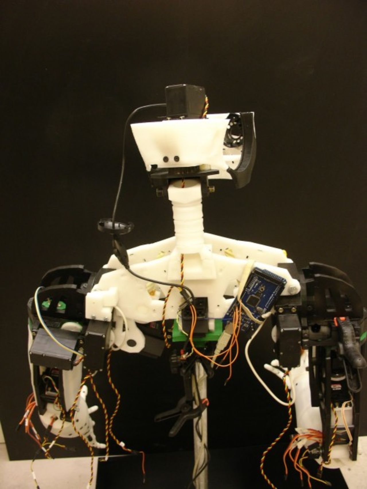 A rear view of InMoov's upper torso reveals a bundle of exposed wires and other electronic components. Although it looks complicated, Langevin assures that, as long as you follow the instructions on his blog, no prior knowledge is required. 