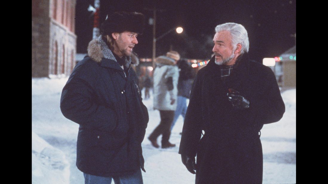 Russell Crowe and Reynolds star in "Mystery, Alaska" in 1999.