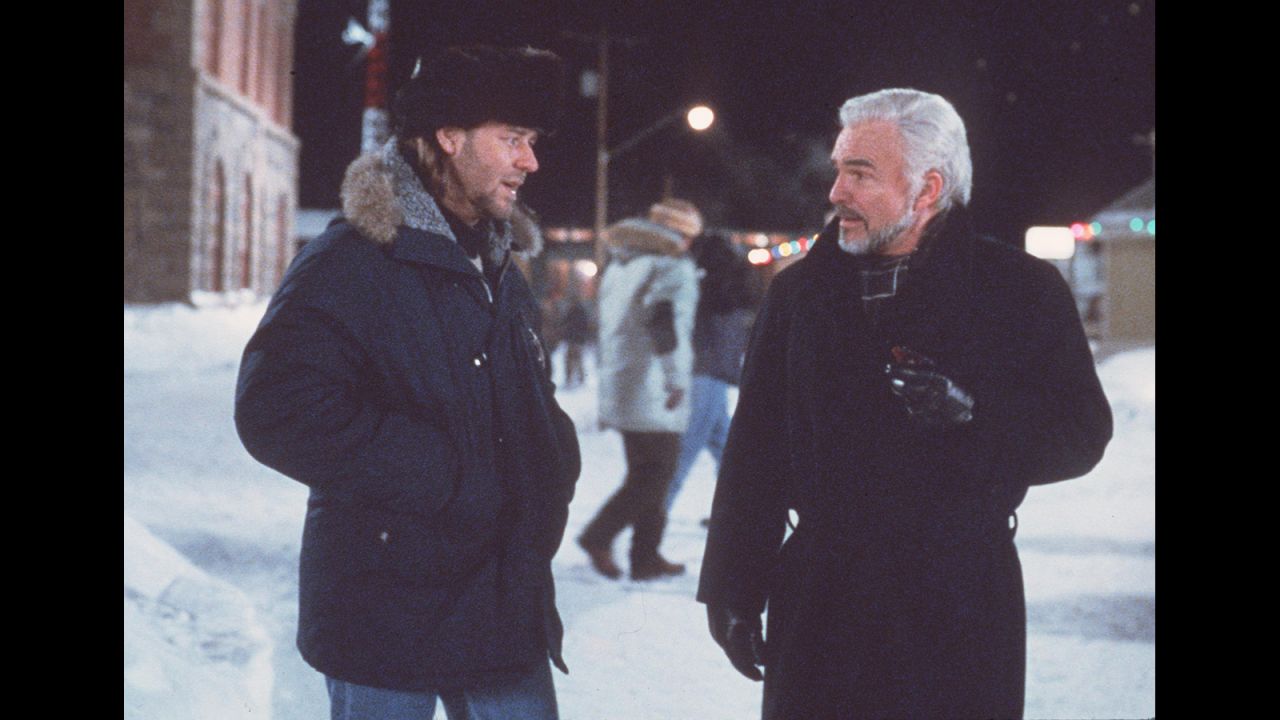 Russell Crowe and Reynolds star in "Mystery, Alaska" in 1999.