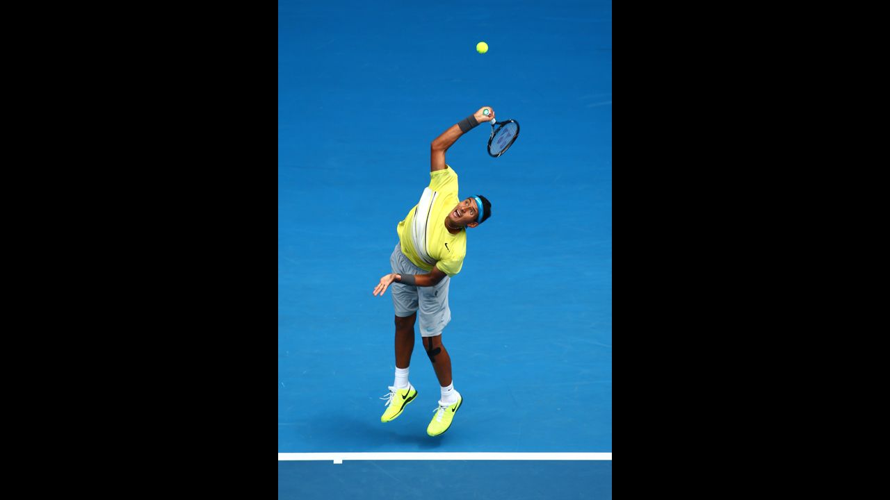 Nick Kyrgios of Australia serves in his junior boys' final match against Thanasi Kokkinakis of Australia on January 26. Kyrgios captured the boys singles title in straight sets.