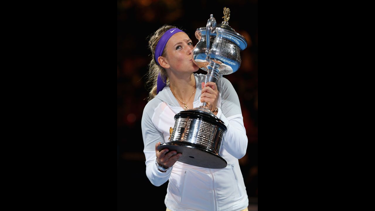 Victoria Azarenka of Belarus poses with the winner's trophy after defending her Australian Open title on Saturday, January 26. Azarenka defeated Na Li of China 4-6, 6-4, 6-3.