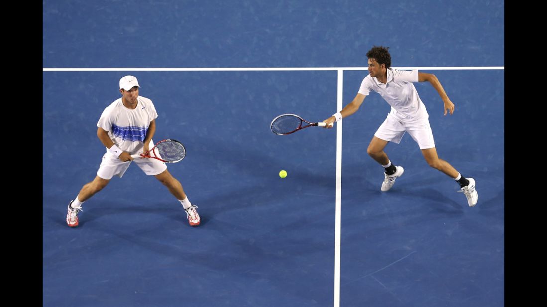 Robin Haase plays a forehand in Saturday's doubles match against the Bryan brothers.