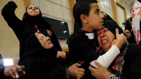 Relatives of victims killed during the 2012 Port Said soccer game react after the verdict of the court, at a courthouse in Cairo, on January 26.