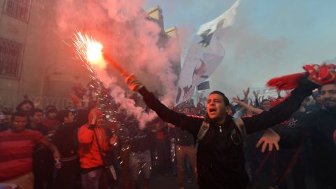 Al-Ahly football club supporters celebrate on January 26.