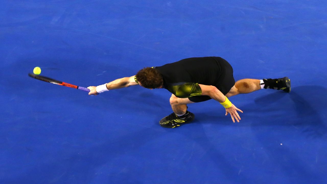 Murray plays a backhand against Djokovic on January 27.