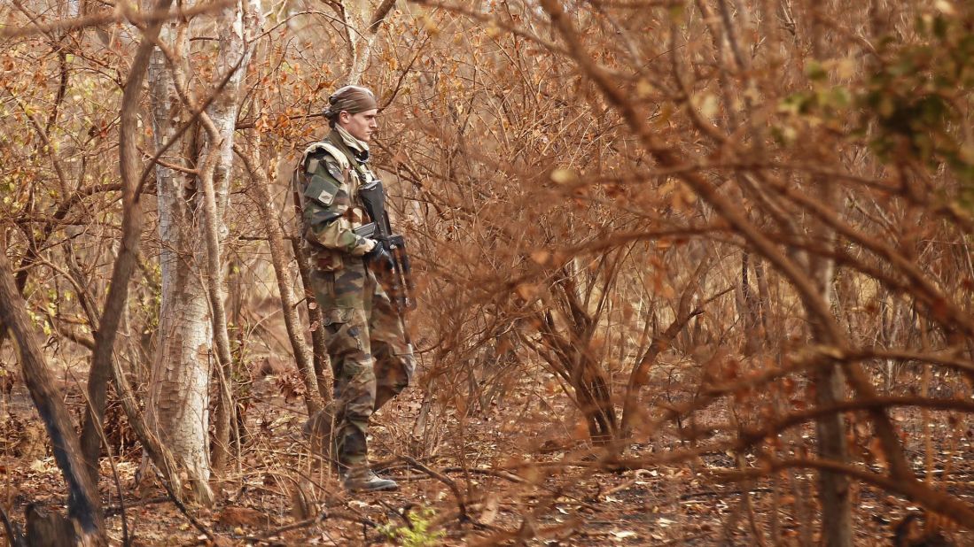 A French soldier walks through the bush in central Mali on January 27.