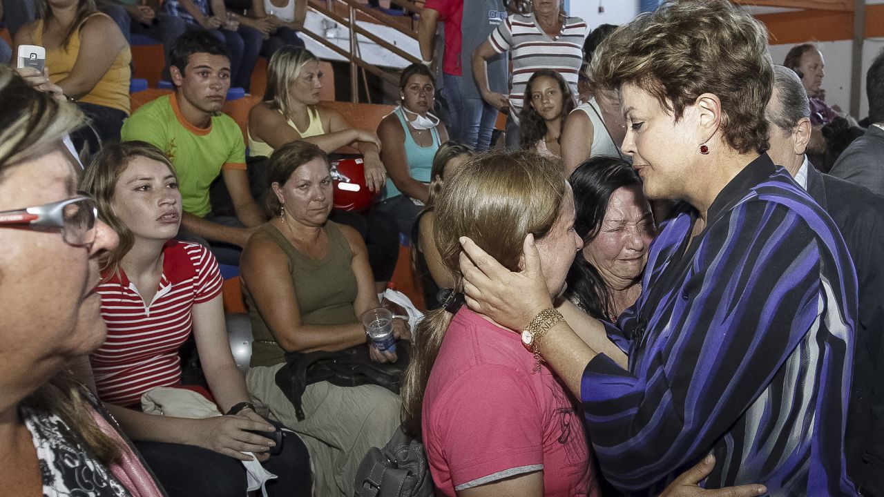 Brazilian President Dilma Rousseff, right, consoles relatives of victims of the fire.