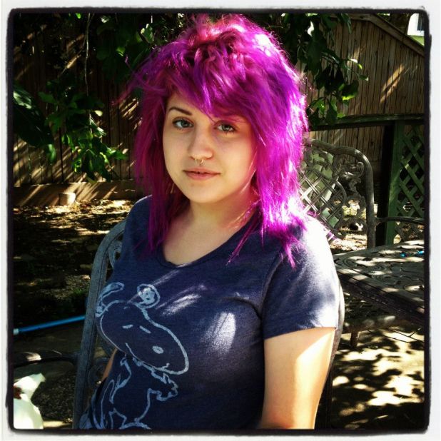 For Emily, a straight A- and B-student with a penchant for dying her hair bright colors, school has never really been a problem, says her stepfather, Tommy Bryant. This family photo was taken in March 2012.