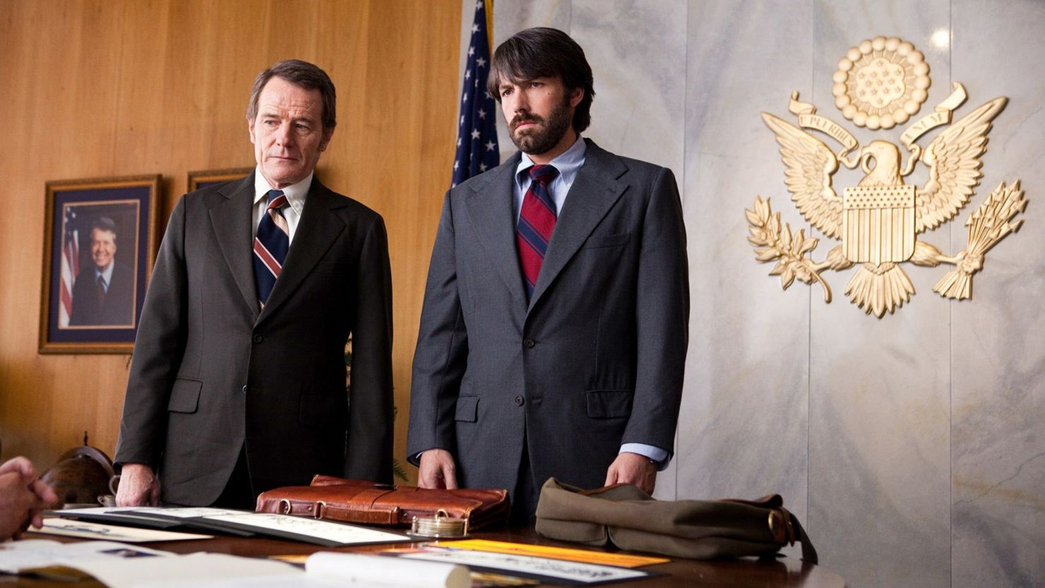 Bryan Cranston, left, and Ben Affleck appear in a scene from the film "Argo."