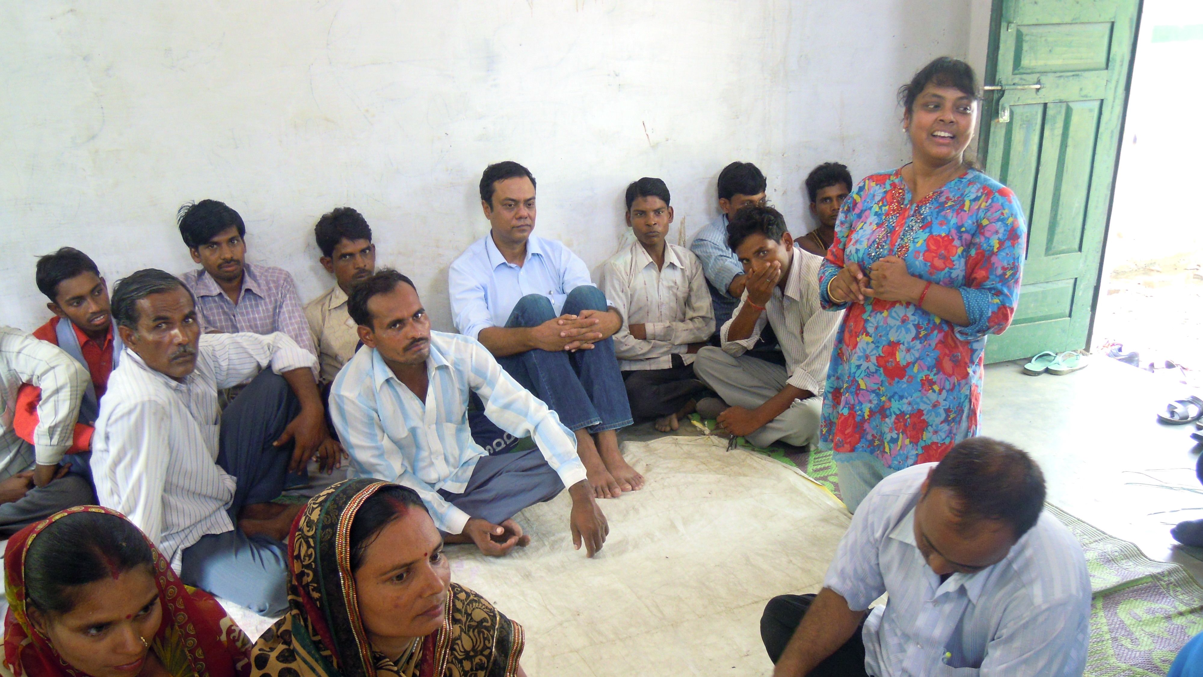 Suniti Neogy, the writer, at a community meeting in the village of Musepur in India, where she discussed the importance of men taking an active role in parenting.