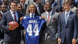 WASHINGTON, DC - JUNE 08: U.S. President Barack Obama (2nd L) poses for photographs with (L-R) New York Giants players Zak DeOssie, Justin Tuck and Eli Manning while welcoming the National Football League Super Bowl champions to the White House June 8, 2012 in Washington, DC. The Giants defeated The New England Patriots 21-17 to win Super Bowl XXXXVI. (Photo by Chip Somodevilla/Getty Images)