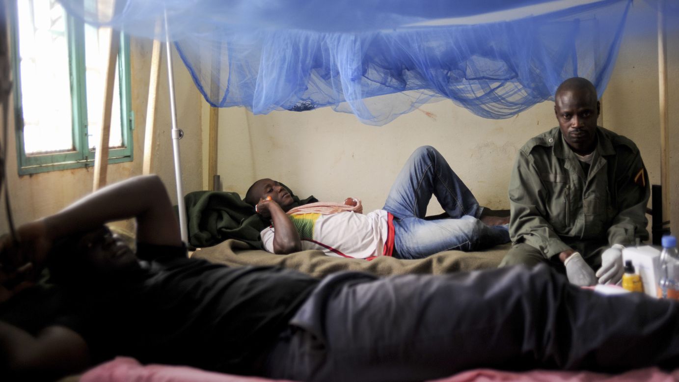 Wounded Malian soldiers rest after receiving medical care at the Polyclinique of Kati on Sunday, January 27.