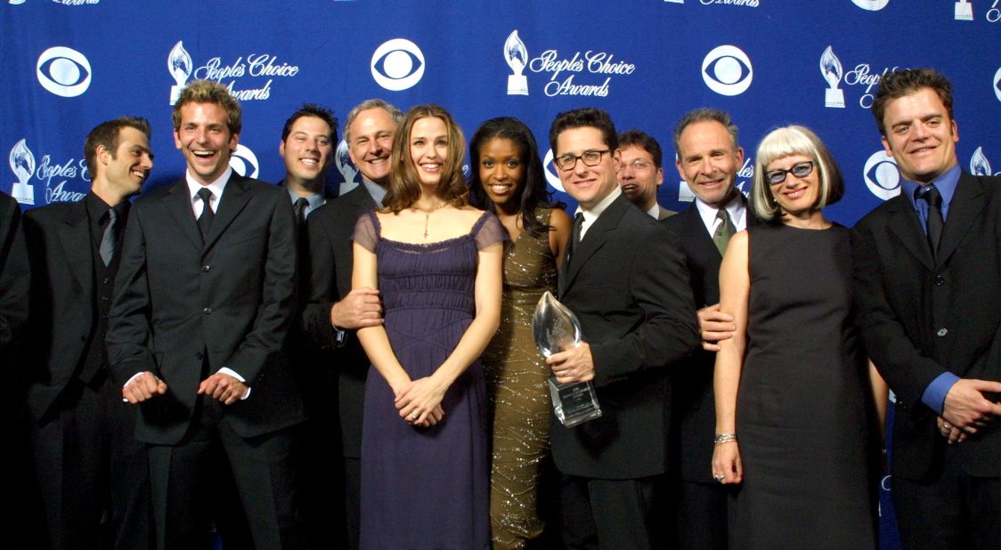 Jennifer Garner became a household name in 2001 with ABC's "Alias," a show Abrams came up with after imagining what Felicity might be like as a CIA spy. Here the cast and crew, including a young Bradley Cooper, celebrated their People's Choice Award in 2002.