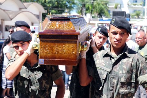 Soldiers carry the coffin of a victim of the nightclub blaze on January 28.