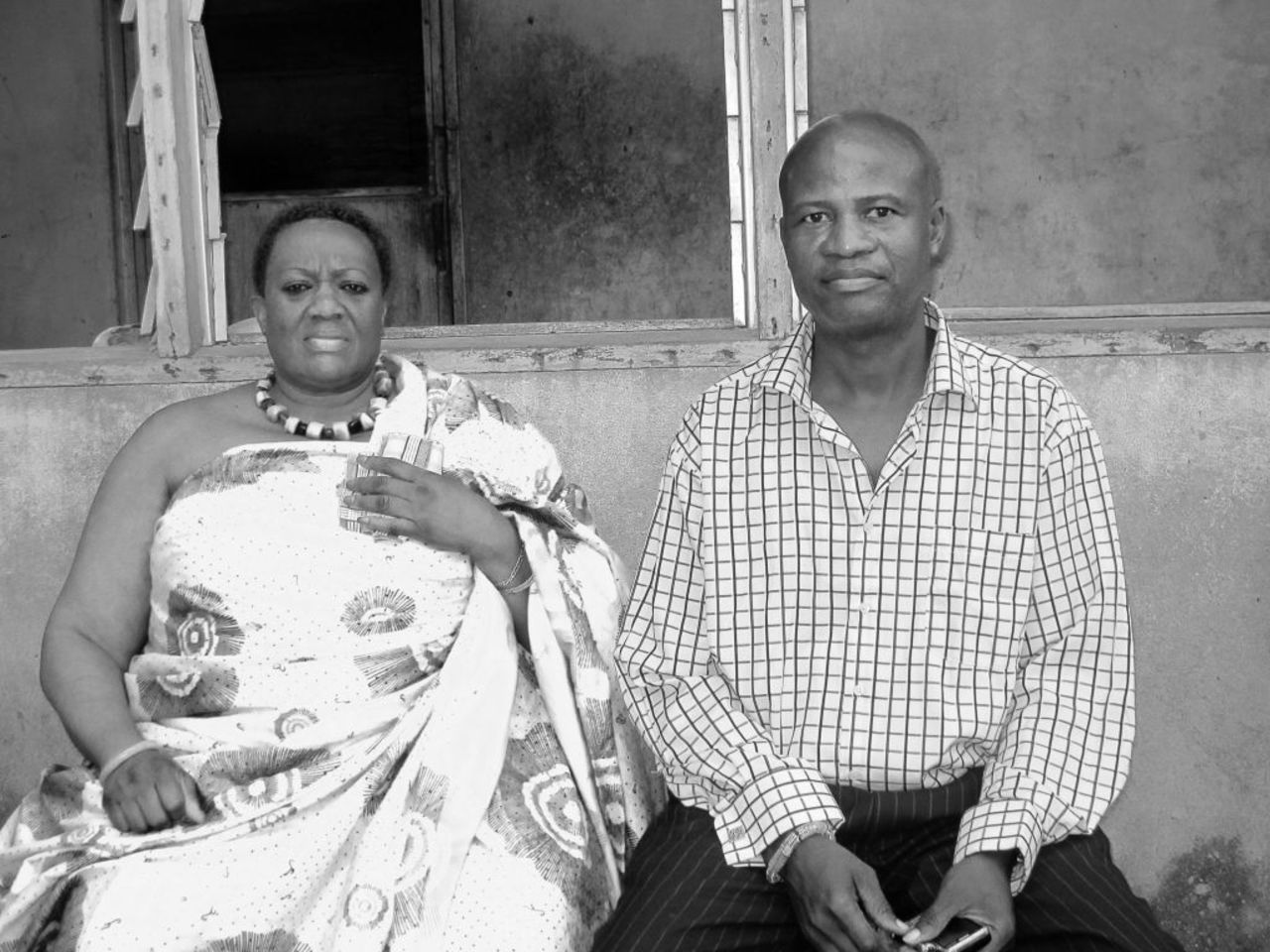 King Peggy with her regent Nana Kwesi. When she's not in Otuam, King Peggy phones her regent on a daily basis to be informed about what's happening in the community.