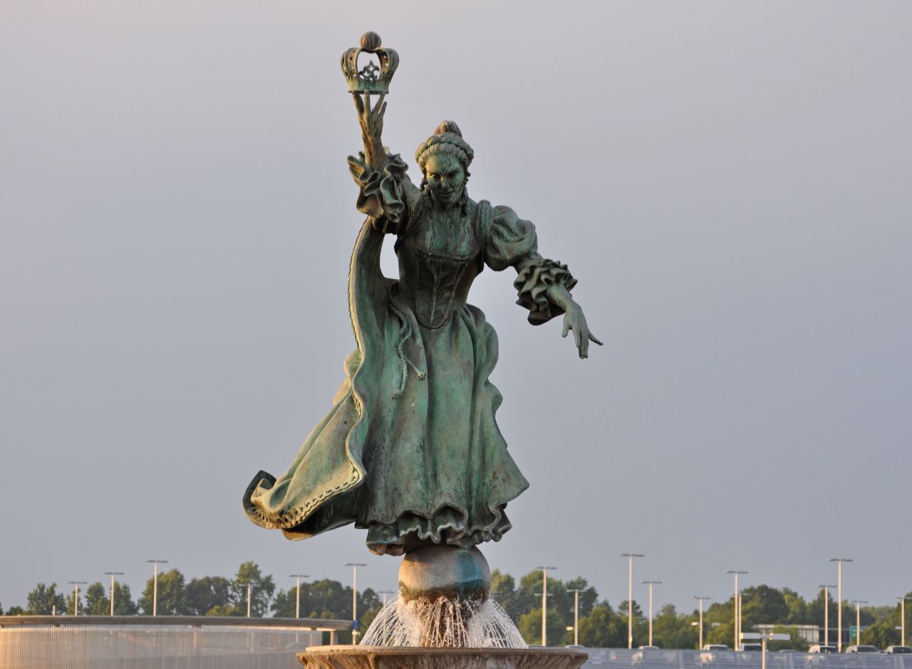 Raymond Kaskey's sculpture of Queen Charlotte of Mecklenburg, for whom the city of Charlotte is named, oversees the city's airport. Charlotte came in second for ease in connecting flights. 