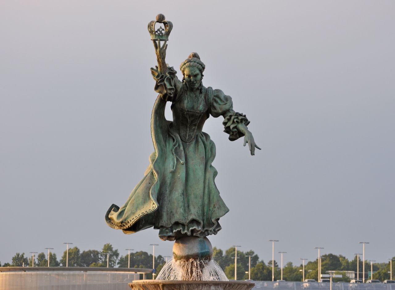 Raymond Kaskey's sculpture of Queen Charlotte of Mecklenburg, for whom the city of Charlotte is named, oversees the city's airport. Charlotte came in second for ease in connecting flights.