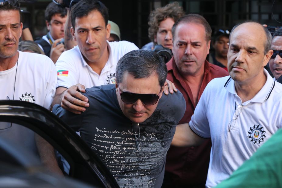 Mauro Hoffman, co-owner of the Kiss nightclub, is taken into custody by police in Santa Maria, Brazil, on Monday, January 28. 