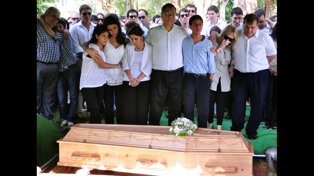 Guido Britez's family attends the funeral on January 29. 