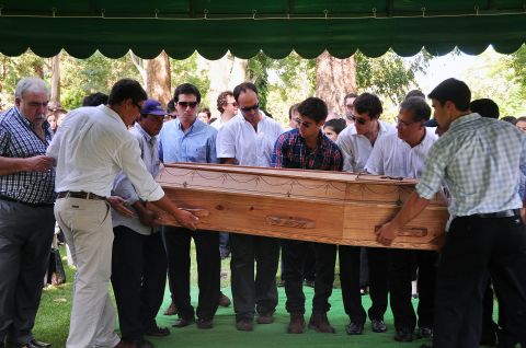Relatives and friends of Paraguayan student Guido Britez, 21, who died in a fire at the Kiss nightclub in Brazil, carry his coffin during the funeral in  Asuncion on Tuesday, January 29. More than 230 people died and more than 120 were injured early Sunday when a fire tore through the nightclub packed with university students in southern Brazil, police said.