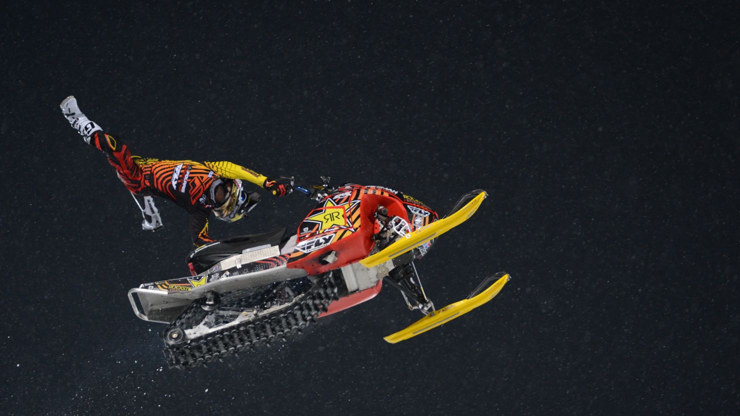 A photo of Caleb Moore's performance in the Snowmobile Freestyle Final during X Games Aspen 2013.