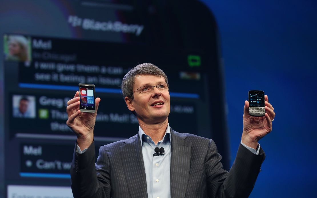 BlackBerry CEO Thorsten Heins displays the new Blackberry 10 smartphones at a launch event in January.