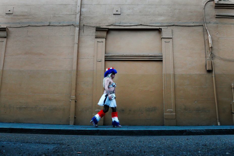A man walks down the street in the French Quarter on January 28.