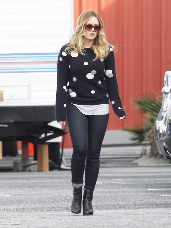 Hilary Duff hangs out on set.