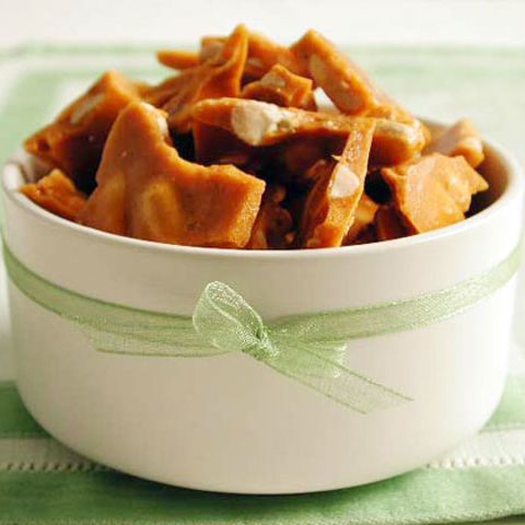 Pepper adds an unexpected bit of heat to this brittle, but you can omit it for a more traditional version. One serving is 105 calories. <strong>Try this recipe:</strong> <a href="http://www.myrecipes.com/recipe/peppered-peanut-brittle-10000000522336/" target="_blank" target="_blank">Peppered peanut brittle</a> 