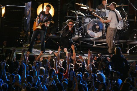 At the first Super Bowl after September 11, U2 performed a tribute to those lost in the attacks. As the band played "MLK," the names of victims appeared on a screen. The show ended with a stirring version of "Where the Streets Have No Name," and Bono revealing the American flag in the lining of his jacket.