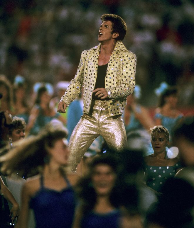 In 1989, Elvis Presley impersonator Elvis Presto took to the Super Bowl stage in head-to-toe gold lame to <a href="http://www.youtube.com/watch?v=b0Mz_TkBvLA&feature=player_embedded" target="_blank" target="_blank">perform</a> "the world's largest card trick" among a bevy of Solid Gold dancers.