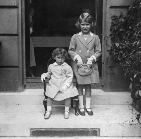 Future queen Princess Elizabeth, right, poses with her sister Princess Margaret in 1933. 