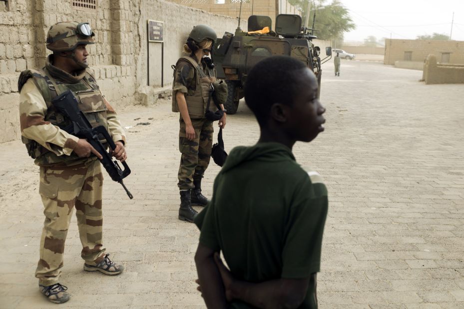 French soldiers patrol next to the Djingareyber mosque, on January 31, in Timbuktu, Mali. The city was recaptured on January 28, by French-led forces in their offensive against Islamist rebels who have been occupying Mali's north since last April. 