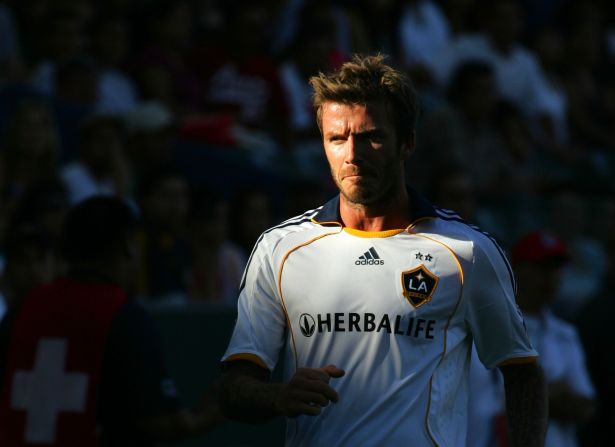 Beckham, during his time with the Los Angeles Galaxy, walks toward the line judge to have a chat during Game 1 of the MLS Western Conference semifinals in 2009.