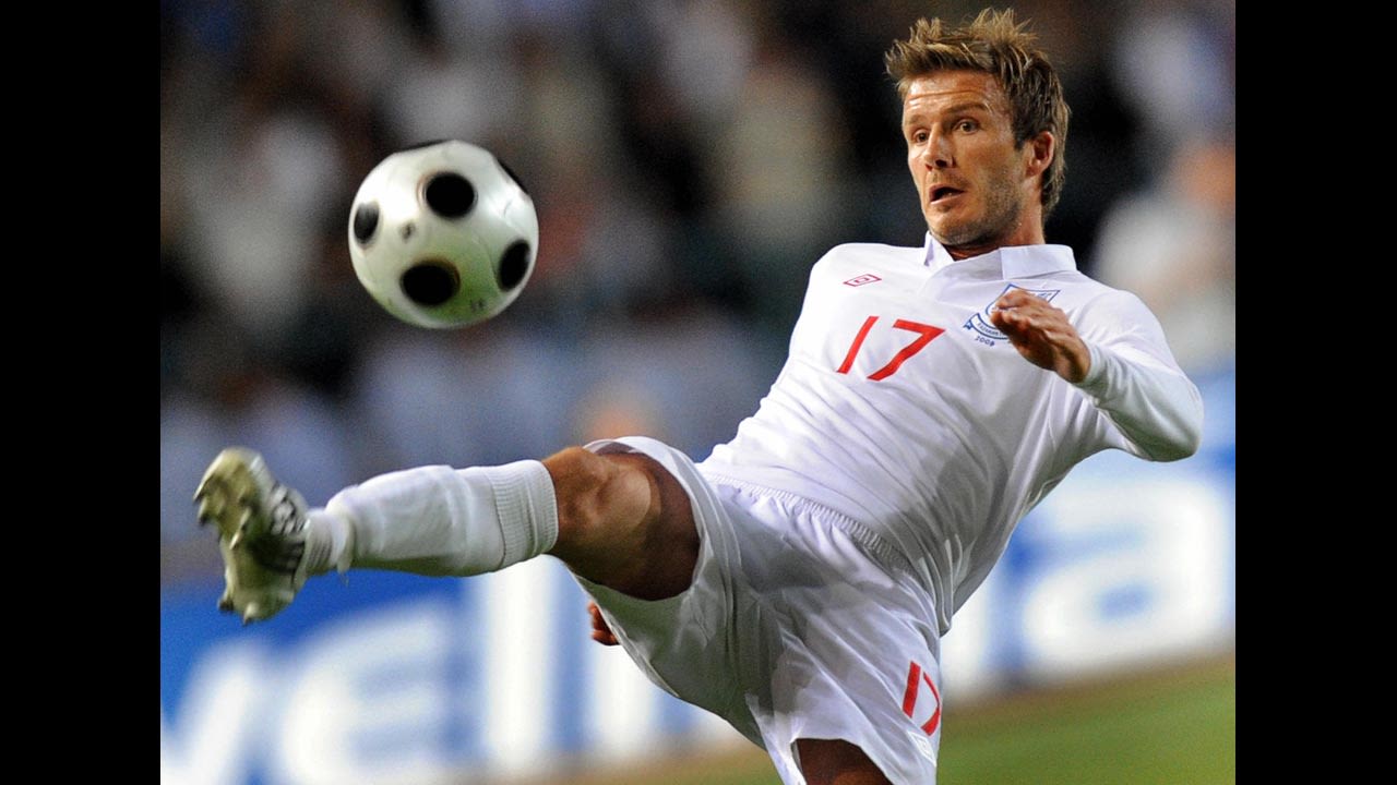 Beckham controls the ball during a 2010 World Cup qualifier.
