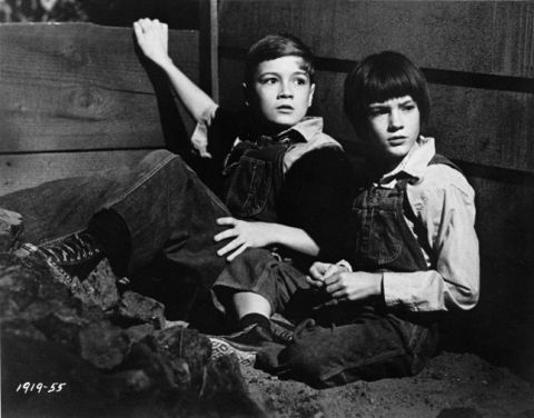 Mary Badham plays Scout Finch in a 1962 film adaptation of Harper Lee's "To Kill a Mockingbird."