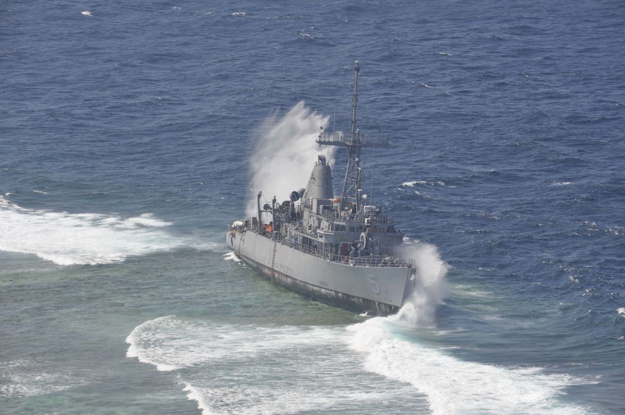 Waves crash against the USS Guardian in January. The minesweeper is estimated to have damaged 4,000 square meters of the Tubbataha Reef, a UNESCO World Heritage site. 