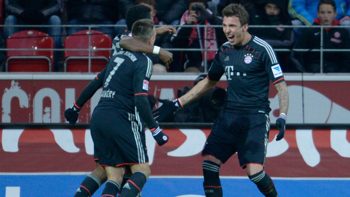 Mario Mandzukic (right) celebrates with his Bayern Munich teammates during the 3-0 against Mainz 