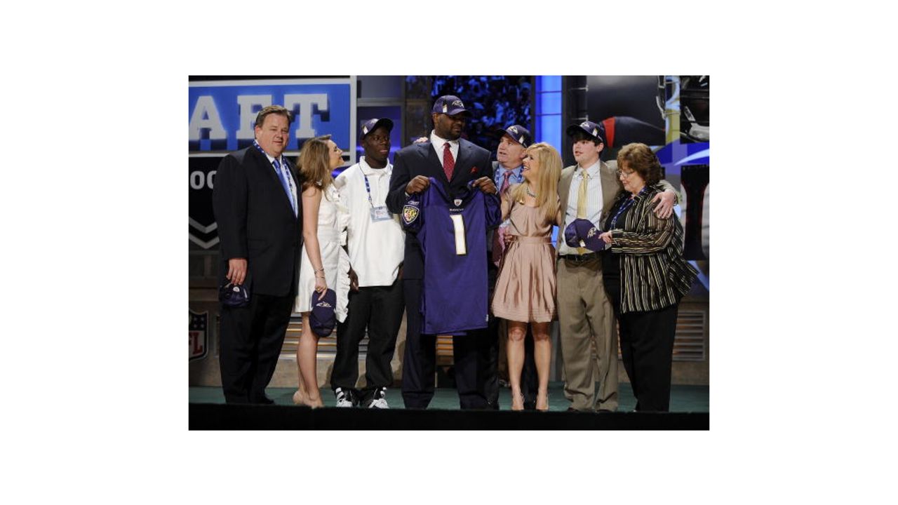 Michael Oher posed with the Tuohy family and others when he was drafted by the Baltimore Ravens in the first round of the 2009 NFL Draft.