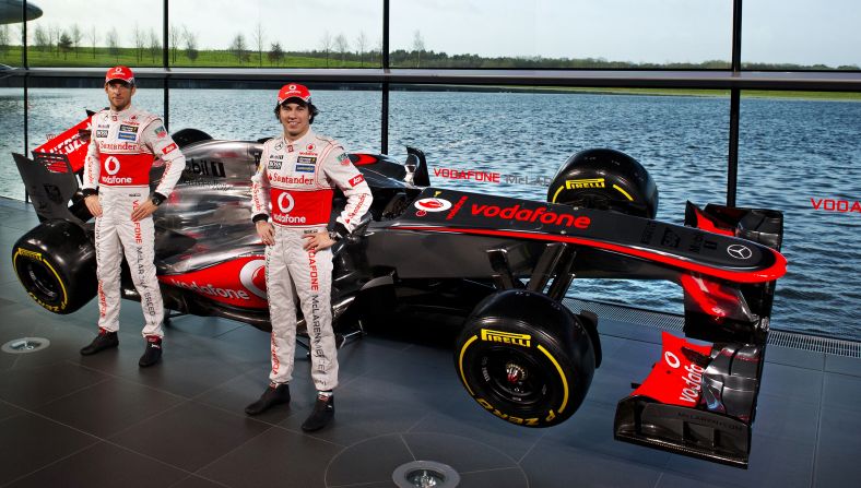 British team McLaren unveiled its car on January 31. New driver Sergio Perez (right) poses with 2009 world champion Jenson Button and the new MP4-28.