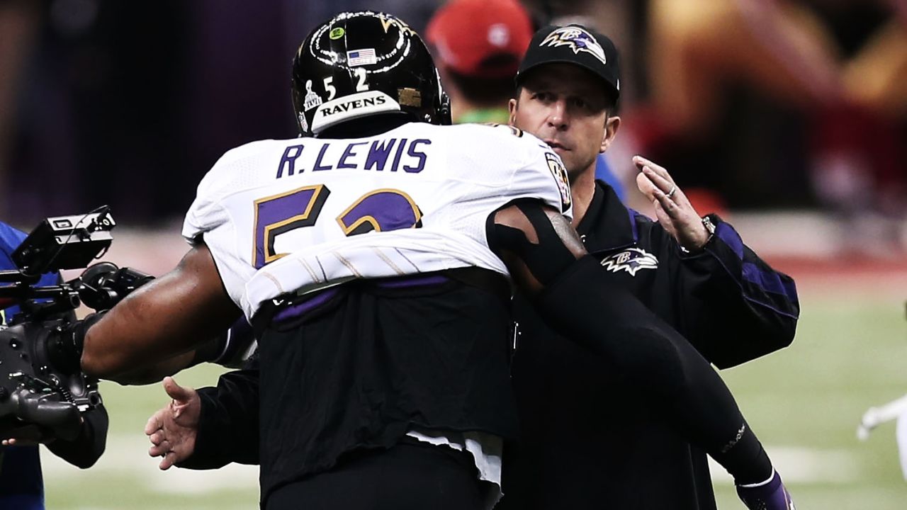 Head coach John Harbaugh of the Baltimore Ravens hugs linebacker Ray Lewis prior to the start of Super Bowl XLVII against the San Francisco 49ers.