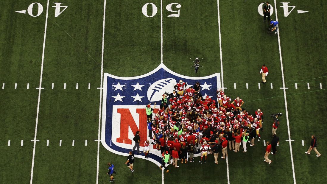 The 49ers huddle on the field prior to taking on the Baltimore Ravens in Super Bowl XLVII.