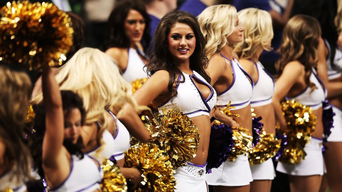 Ravens cheerleaders stand on the sidelines before Sunday night's game against the 49ers.