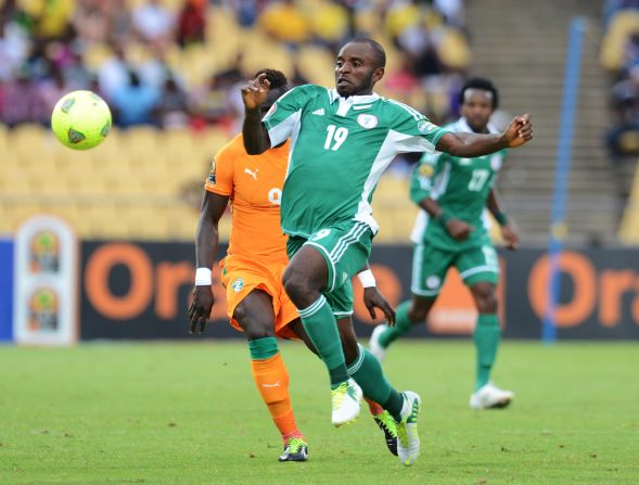Cheick Tiote leveled for the tournament favorite but Sunday Mba's 78th-minute winner earned Nigeria a semifinal clash against Mali.