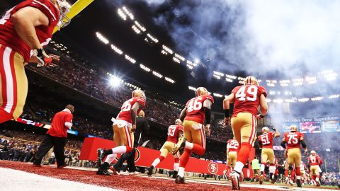 The San Francisco 49ers take the field.